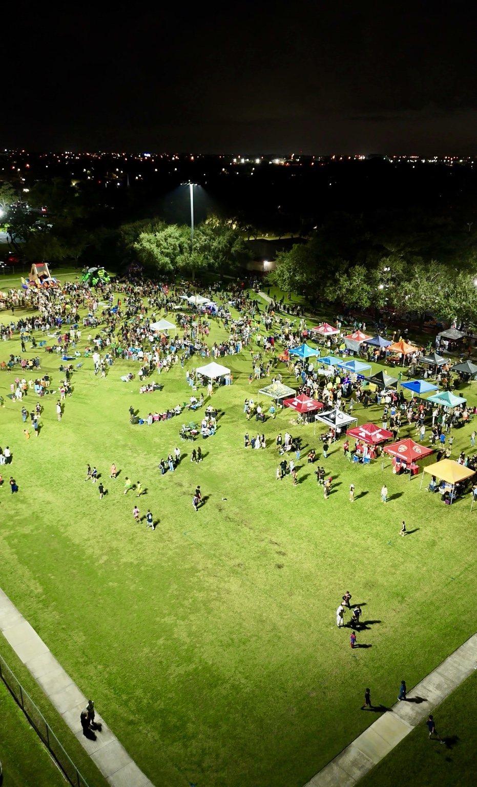 Aerial view of a lively neighborhood celebration in Cutler Bay